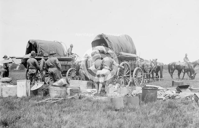 Unloading supplies, N.Y.N.G., between c1910 and c1915. Creator: Bain News Service.