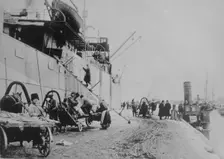 Unloading SEATTLE, Archangel, between c1915 and c1920. Creator: Bain News Service