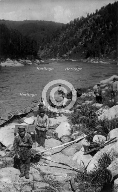 Unloading the Land-Management Expedition Boats, for Detouring the Mrassu River Rapid, 1913. Creator: GI Ivanov.