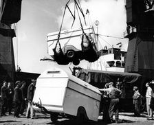 Unloading trailers from a ship, (c1950s?)