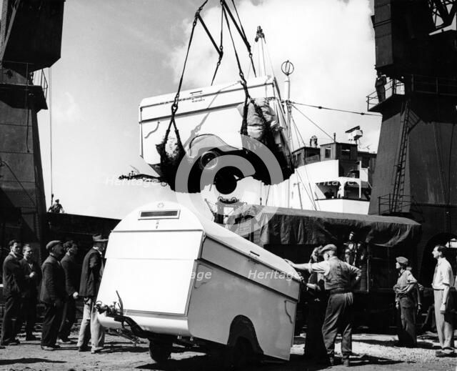 Unloading trailers from a ship, (c1950s?). Artist: Unknown
