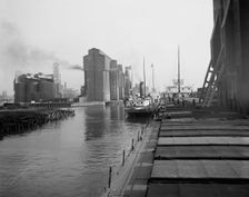 Unloading wheat, Buffalo, N.Y., c.between 1910 and 1920. Creator: Unknown