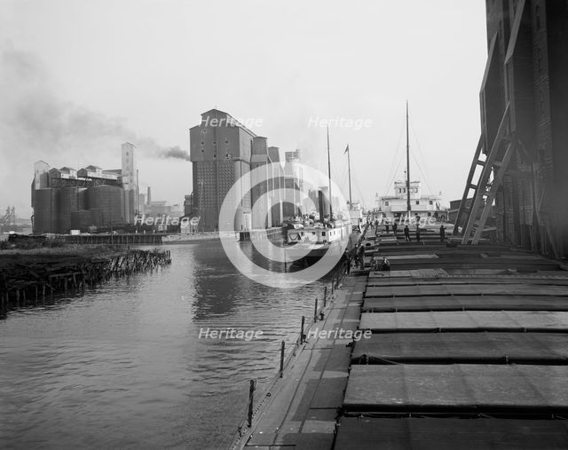 Unloading wheat, Buffalo, N.Y., c.between 1910 and 1920. Creator: Unknown.