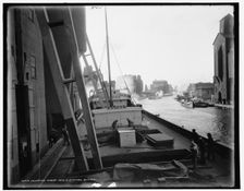 Unloading wheat into elevators, Buffalo, c1900. Creator: Unknown