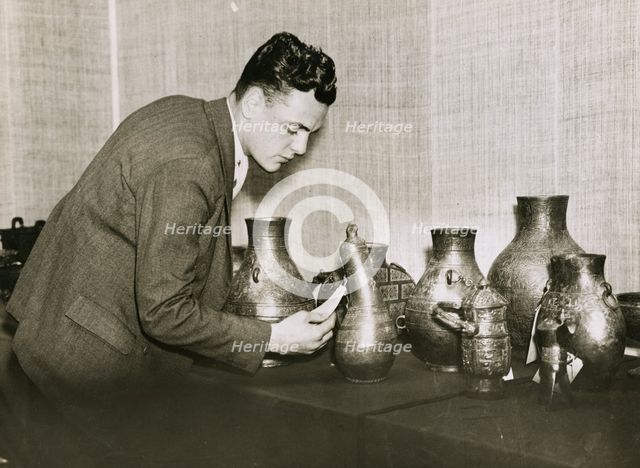 Unpacking and examining the exhibits for the 'International Exhibition of Chinese Art', 1935. Creator: Sport and General Press Agency.