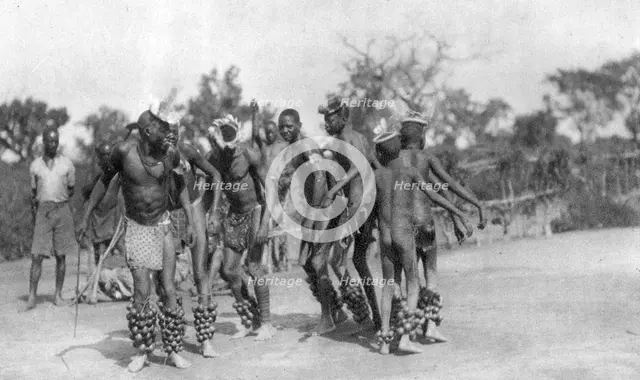 Ugandan dancers, Dodoma to Mongalla, Uganda, 1925 (1927). Artist: Thomas A Glover