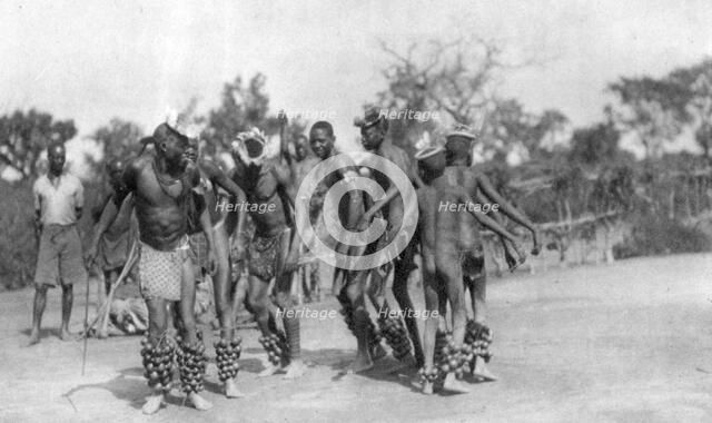 Ugandan dancers, Dodoma to Mongalla, Uganda, 1925 (1927). Artist: Thomas A Glover