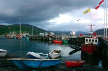 Ullapool harbour on a stormy evening, Highland, Scotland. Creator: Peter Thompson
