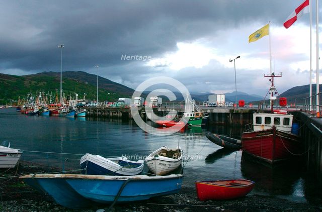 Ullapool harbour on a stormy evening, Highland, Scotland. Creator: Peter Thompson.