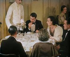 Upper Class People Enjoying a Meal in a Restaurant, 1931. Creator: British Pathe Ltd