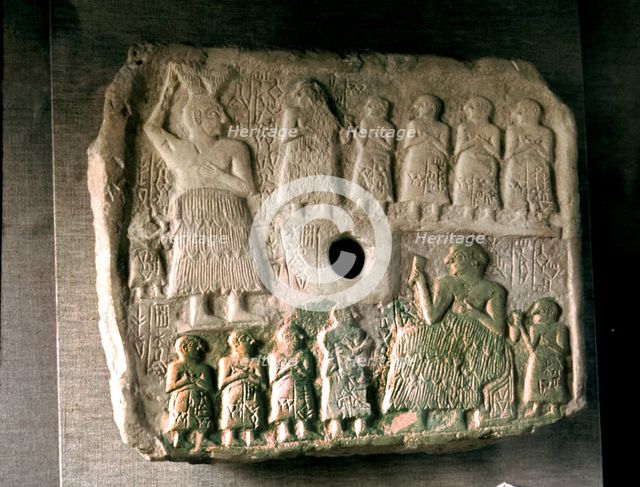 Ur-Nanshe, king of Lagash commemorates the construction of a temple, relief in limestone.