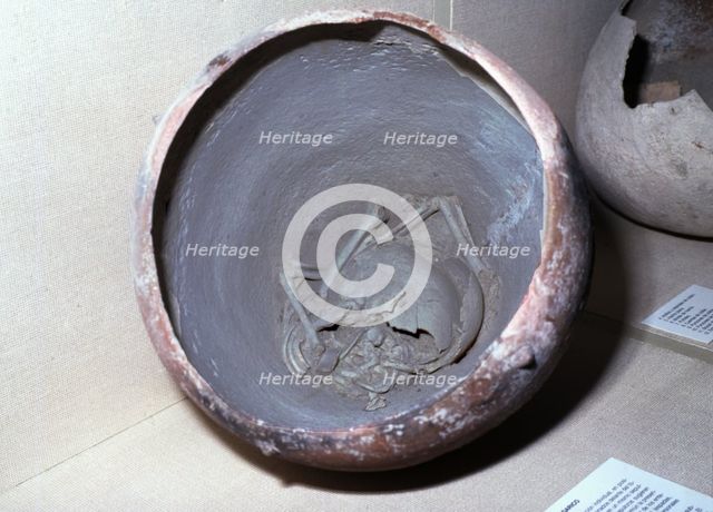 Urn of argaric pottery urn with an infant burial inside, from the town of Cerro de las Viñas (Coy…