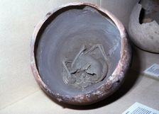 Urn of argaric pottery urn with an infant burial inside, from the town of Cerro de las Viñas (Coy…