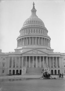 U.S. Capitol - Cleaning Exterior, 1913. Creator: Harris & Ewing