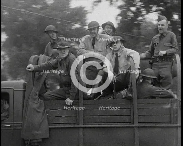 US Army Trucks and Cars Lining the Road, 1932. Creator: British Pathe Ltd.