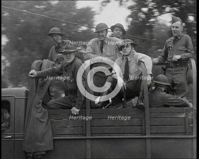 US Army Trucks and Cars Lining the Road, 1932. Creator: British Pathe Ltd.