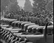 US Army Trucks and Cars Lining the Road, 1932. Creator: British Pathe Ltd