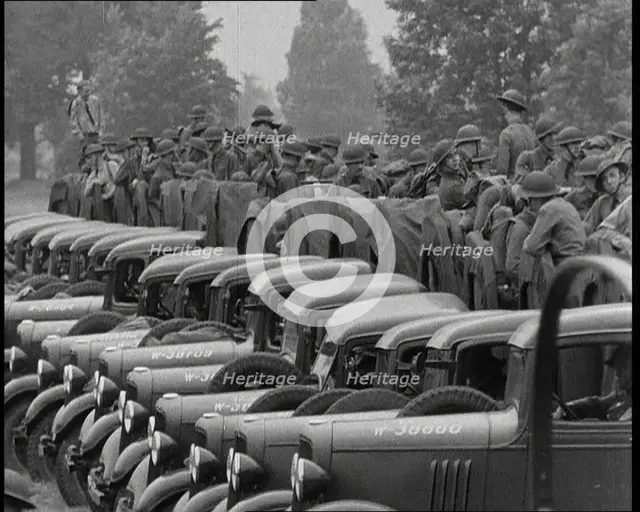 US Army Trucks and Cars Lining the Road, 1932. Creator: British Pathe Ltd.