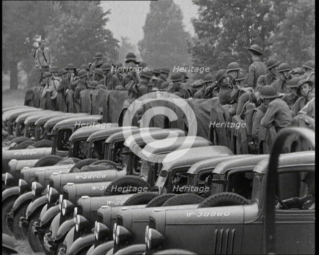 US Army Trucks and Cars Lining the Road, 1932. Creator: British Pathe Ltd.