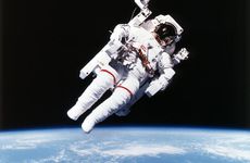 US Astronaut Bruce McCandless spacewalking, 1984. Artist: Unknown