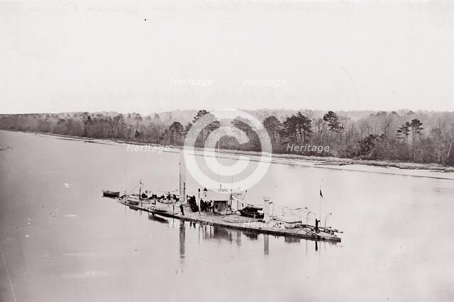 U.S. Monitor "Casco" on James River, taken from a lookout tower on bank., 1861-65. Creator: Unknown.