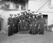 U.S.S. New York, a gun crew, anniversary of Santiago, 1899, 1899. Creator: Edward H Hart