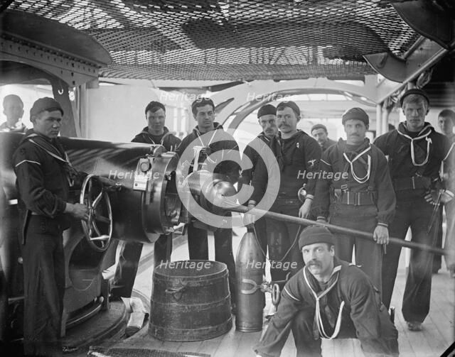 U.S.S. New York, breech of 8 inch gun and crew, between 1893 and 1901. Creator: William H. Jackson.