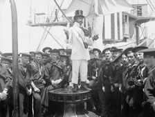 U.S.S. New York, "Lord Cassidy" selling pools, anniversary of Santiago, 1899, 1899. Creator: Edward H Hart