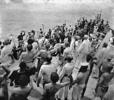 U.S.S. Oregon, cheering the hauling down of the Colon's colors, Battle of Santiago, 1899 July. Creator: Edward H Hart