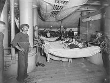 U.S.S. Brooklyn, hammocks on deck, between 1896 and 1899. Creator: Unknown