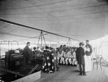 U.S.S. Texas, presentation of cross and badge to Ensign Gherardi by the King's..., Aug. 8, 1897. Creator: Unknown