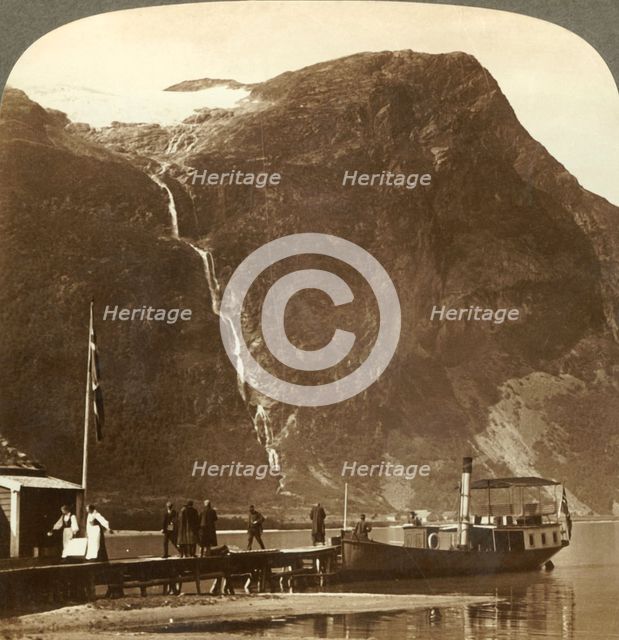 'Utigards Falls from Ravnefjeld glacier at Lake Loen - from Naesdal, Norway', c1905. Creator: Unknown.