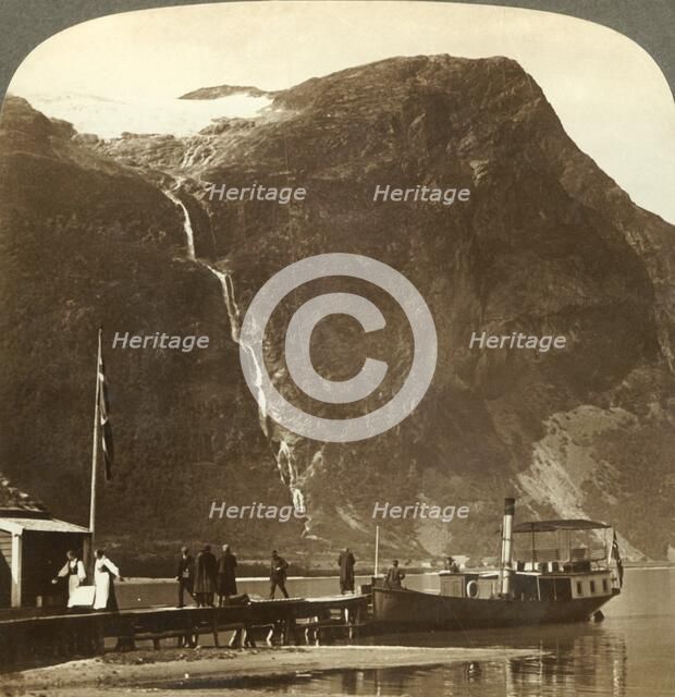 'Utigards Falls from Ravnefjeld glacier at Lake Loen - from Naesdal, Norway', c1905. Creator: Unknown.