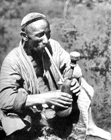 Uzbek man smoking calian, Samarkand, 1936
