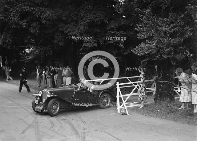 VM Roberts' MG Magnette NA, winner of a bronze award at the MCC Torquay Rally, July 1937. Artist: Bill Brunell.