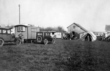 Voyageur caravan with Austin Seven on campsite early 1930's. Creator: Unknown