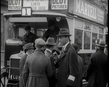 Volunteer Male Civilian Driving a Tram With a Police Escort Sitting Beside Him, 1926. Creator: British Pathe Ltd
