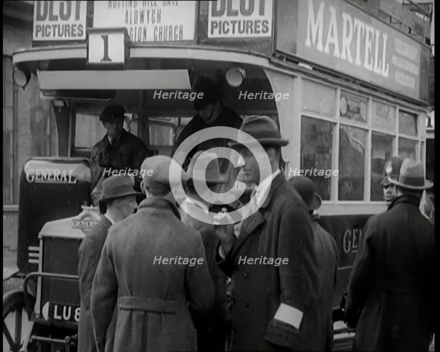 Volunteer Male Civilian Driving a Tram With a Police Escort Sitting Beside Him, 1926. Creator: British Pathe Ltd.
