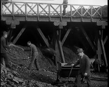 Volunteer Male Civilians Shovelling Coal, 1926. Creator: British Pathe Ltd
