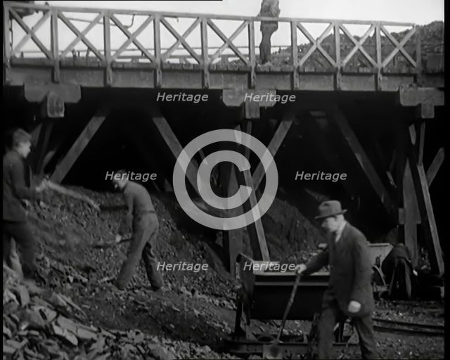 Volunteer Male Civilians Shovelling Coal, 1926. Creator: British Pathe Ltd.