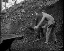 Volunteer Male Civilians Shovelling Coal, 1926. Creator: British Pathe Ltd