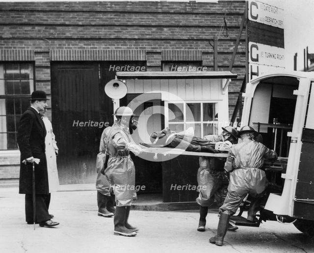 Volunteer stretcher party at Vauxhall factory, Wing Commander Hodsall, WW2.. Creator: Unknown.