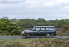 Volvo 244 Estate driving in New Forest, 2012. Creator: Tim Woodcock
