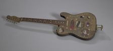 Voodoo Guitar "Marie" made by Don Moser with debris from Hurricane Katrina, 2005. Creator: Don Moser