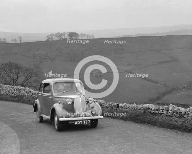 Vauxhall 10 of Miss IM Burton competing in the RAC Rally, 1939 Artist: Bill Brunell.