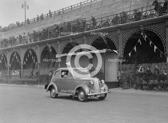 Vauxhall 10 of Miss IM Burton at the RAC Rally, Madeira Drive, Brighton, 1939. Artist: Bill Brunell.