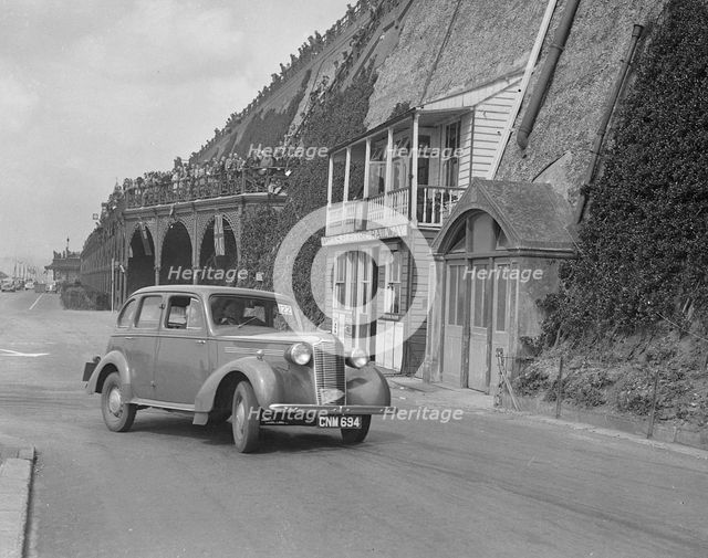 Vauxhall 14-6 of GL Boughton competing in the RAC Rally, Madeira Drive, Brighton, 1939. Artist: Bill Brunell.