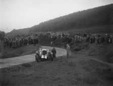 Vauxhall 30-98 of Humphrey Cook off the road at the Caerphilly Hillclimb, Wales, 1922. Artist: Bill Brunell