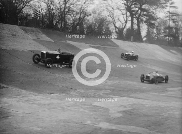 Vauxhall, Riley and Amilcar racing at a BARC meeting, Brooklands, Surrey, 1931 Artist: Bill Brunell.