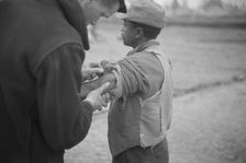 Vaccination in the camp for Negro flood refugees at Marianna, Arkansas, 1937. Creator: Walker Evans